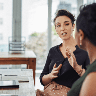 Communication skills training showing colleagues in discussion